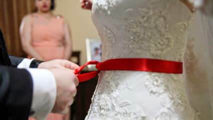 Hvad er betydningen af ​​det røde bånd? Hvorfor er det røde bælte bundet til bruden?