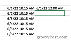 Fjernelse af tid fra et tidsstempel i Excel