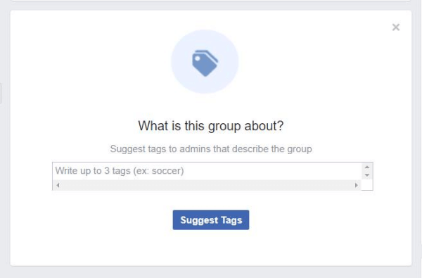 En pop op-vindue, der findes i Facebook-grupper, beder medlemmerne om at foreslå tags, der beskriver gruppen.