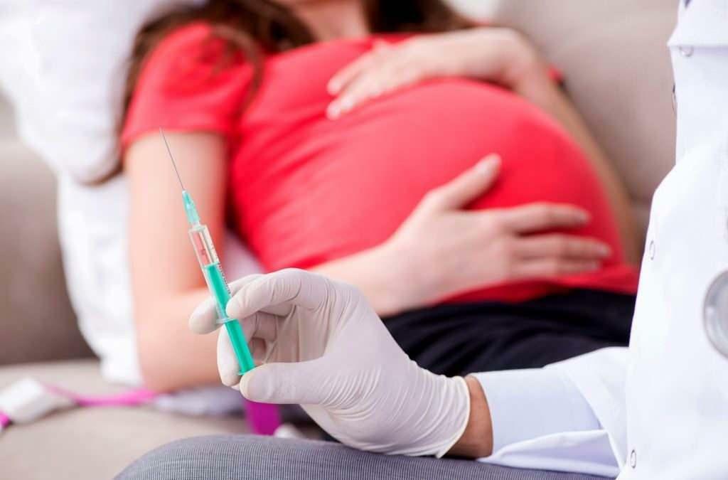 I hvilke måneder af graviditeten skal influenzavaccinen gives?
